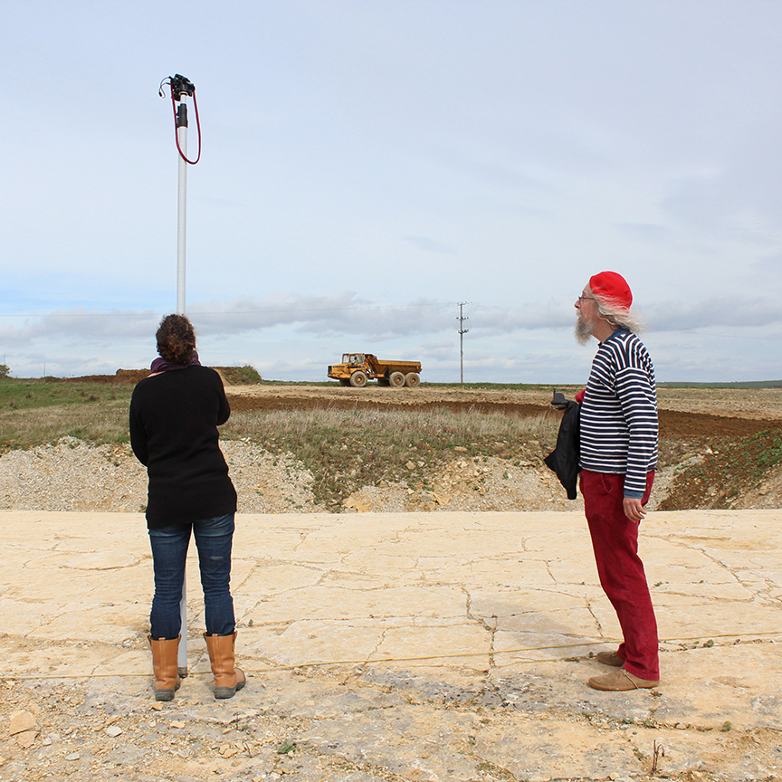 Photographing the footprints using a remote controlled camera and photo-pole